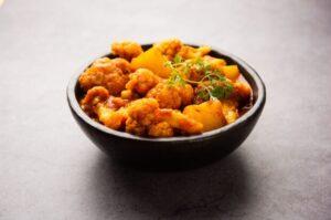 A bowl of potato and cauliflower curry